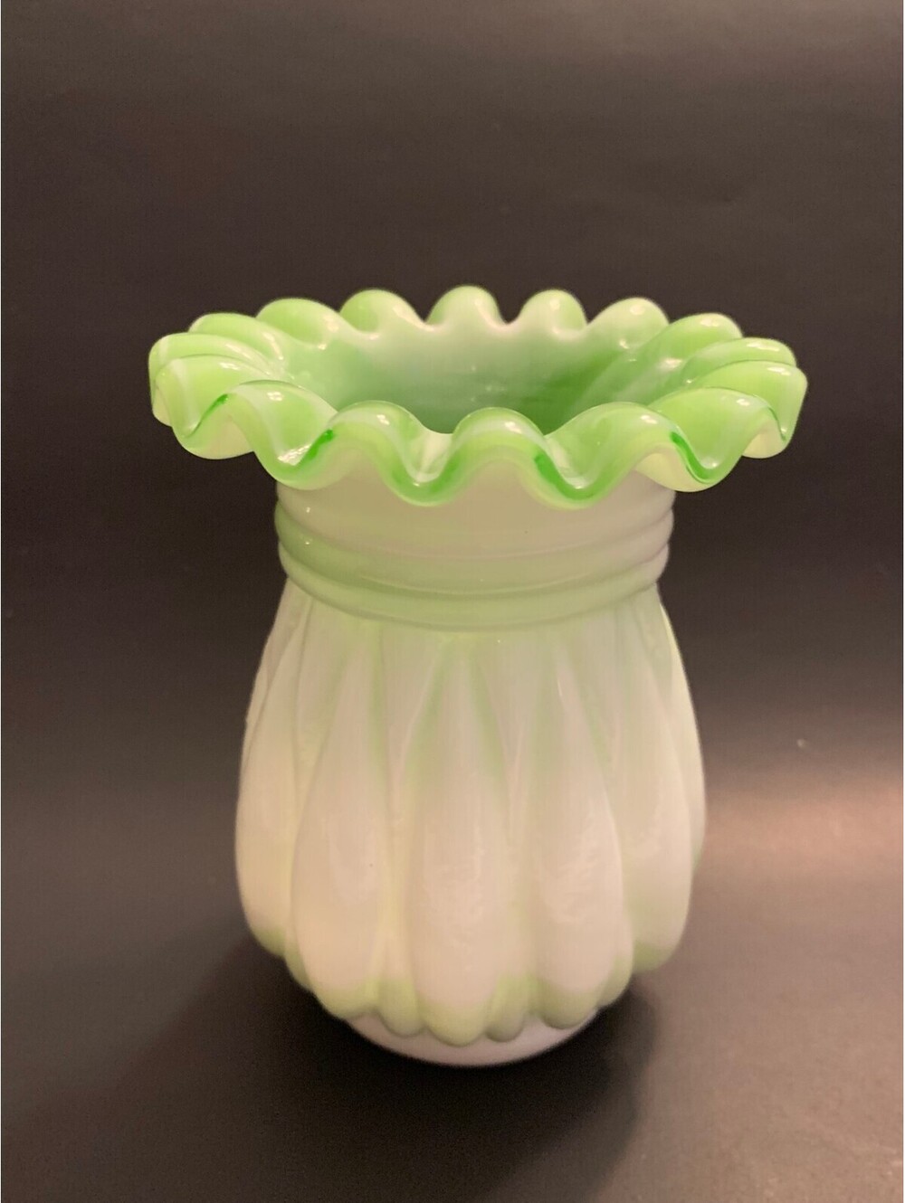 Finton vase Fluted or ribbed melon-style body with a crimped, scalloped rim.